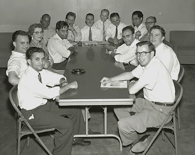 Students sitting around a table in 1960