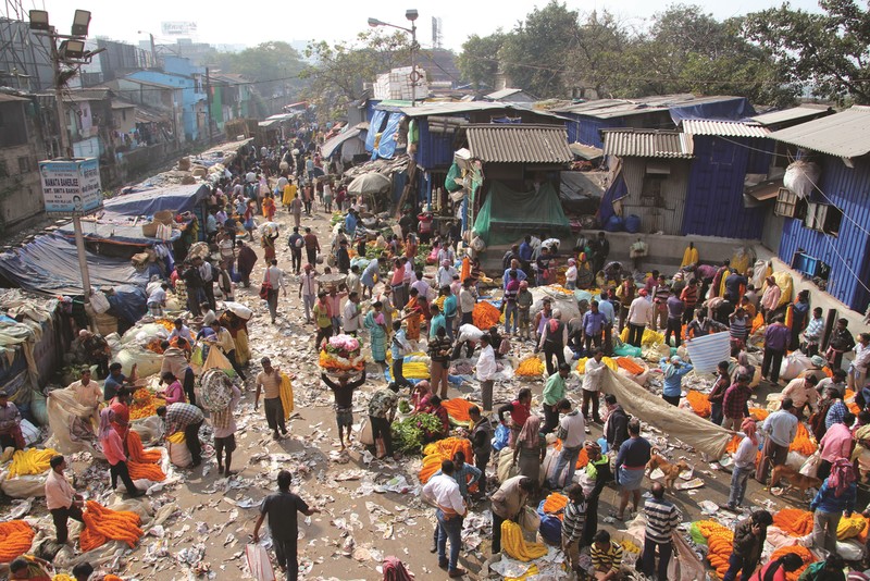 A street filled with people in India
