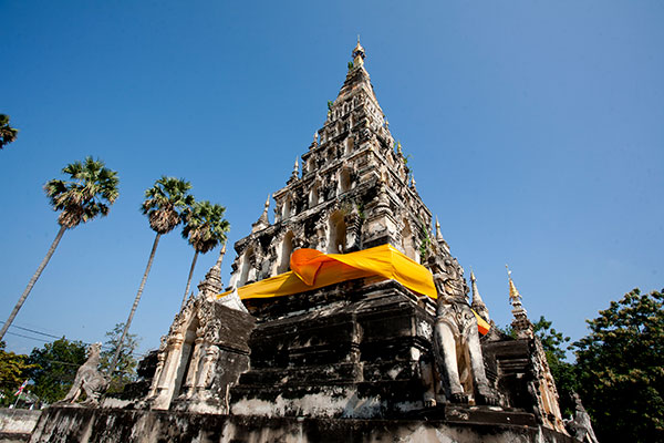 Thai temple with banner and blue sky