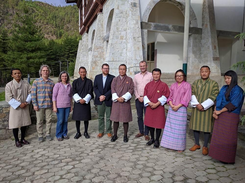 ICI’s Renáta Tichá, principal investigator, and Brian Abery, co-principal investigator, with local and international colleagues in Bhutan in 2019