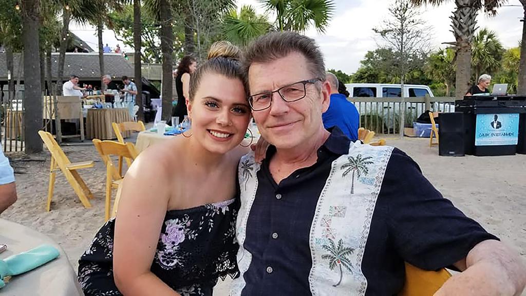 Eckert with her dad, pictured on the beach in 2018. (Submitted photo)