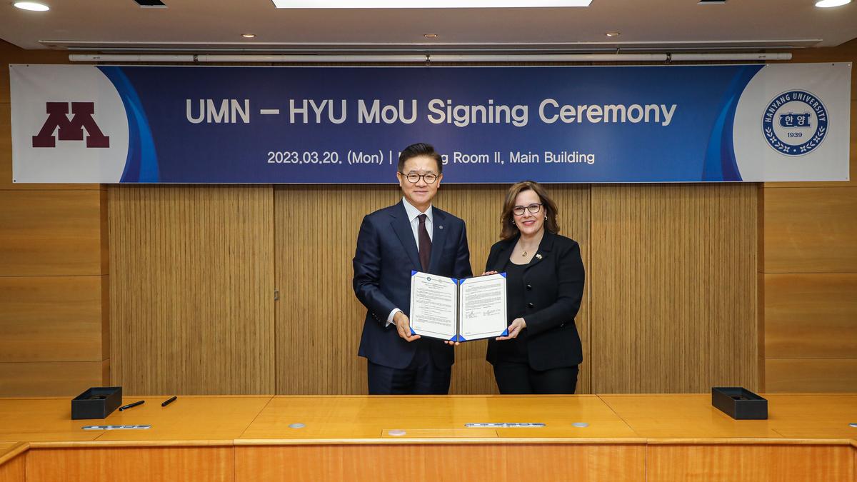 President Gabel poses with president of Hanyang University after signing agreement