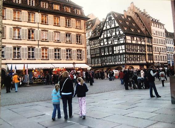 Eckert holds her mom's hand with her sister, while exploring Strasbourg, Germany in 2008. (Submitted photo)