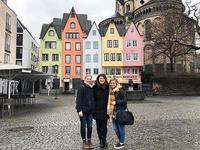 Elyse Eckert (right) poseswith friends in front of Herings Im Martinswinkel, a colorful restaurant in Cologne, Germany. (Submitted photo)