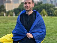 Roman wrapped in a Ukrainian flag