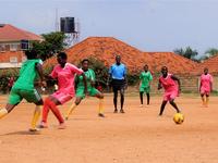 Women playing soccer in Uganda