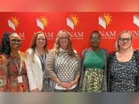 Amy Hewitt, Mikala Mukongolwa, Traci LaLiberte, and others at the University of Namibia in June 2024